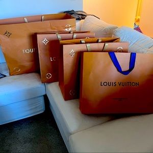 Authentic Louis Vuitton Shopping Bags 3 medium and one jumbo.